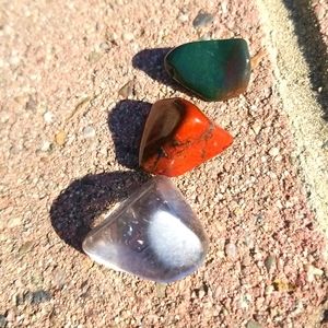 3 gemstones/ metaphysical rocks/ clear quartz and some colorful don't know names
